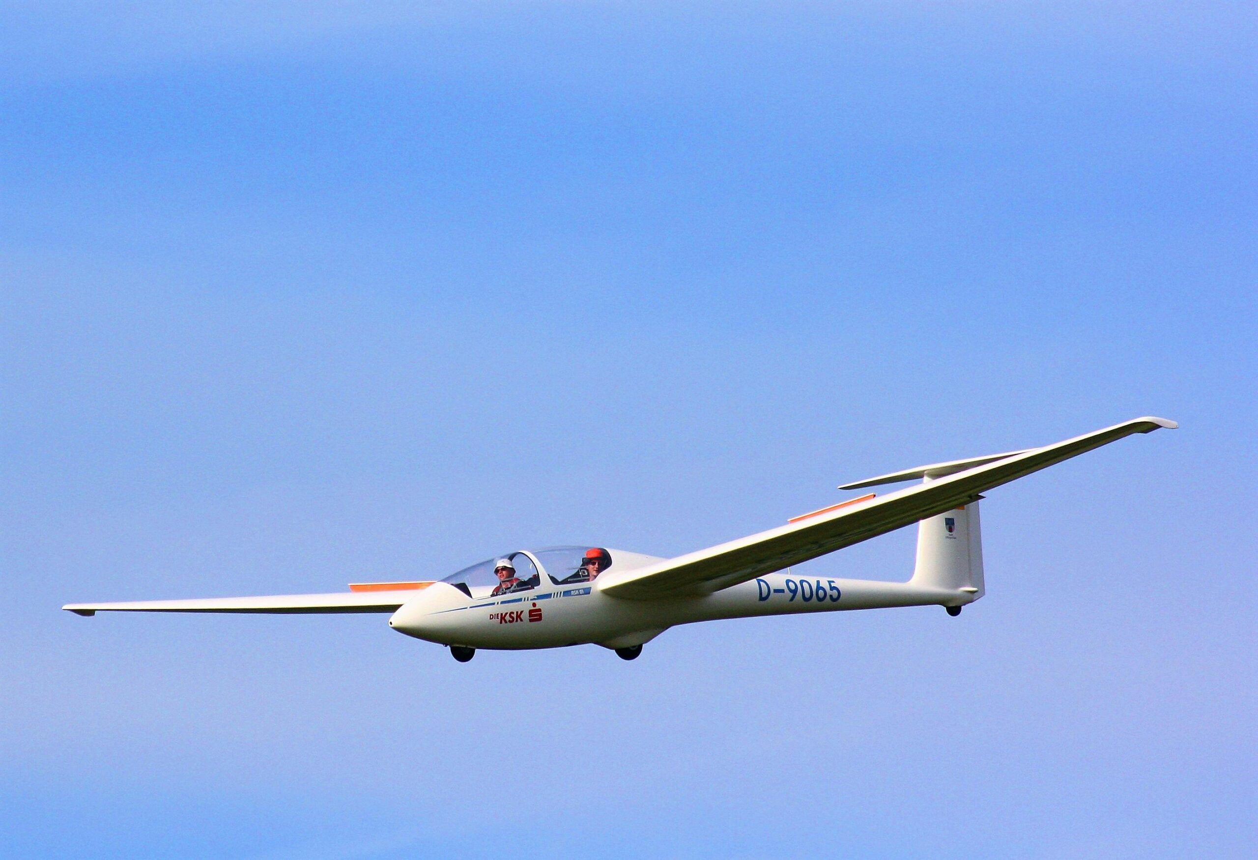 RC glider flying in clear sky